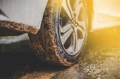 mud cleaner for car|car getting stuck in mud.